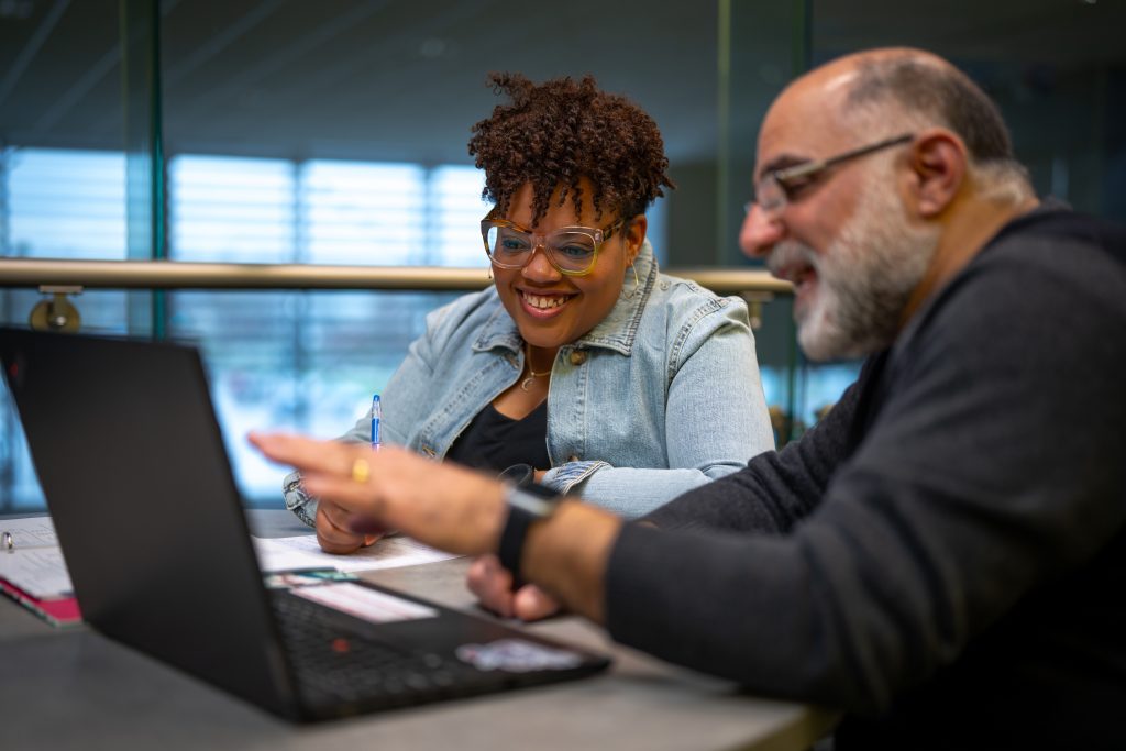 student and faculty member in tutoring session