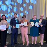 PTK Ohio Region Conference Awards, 7 recipients standing with awards