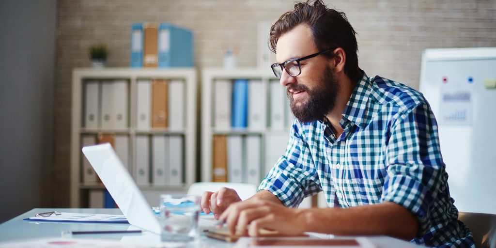 Student studying online with laptop