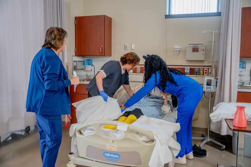 certified nurse aide (CNA), lab, students, instructor and patient exercise