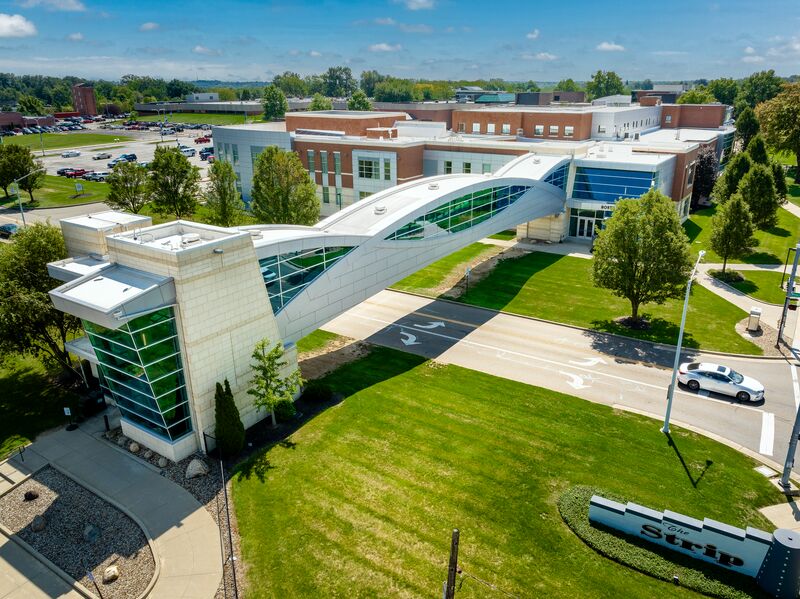 Stark State main campus drone photo of walking bridge