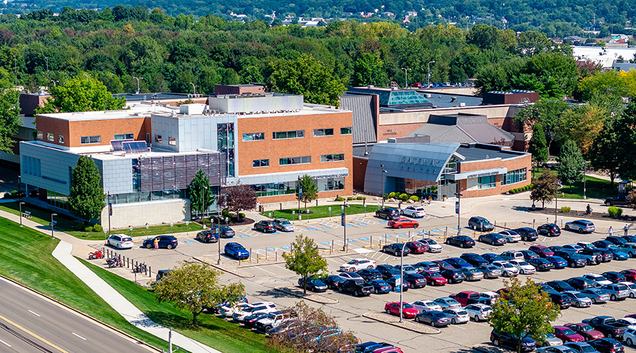 Main campus aerial photo, drone photo, buildings and cars in parking lot