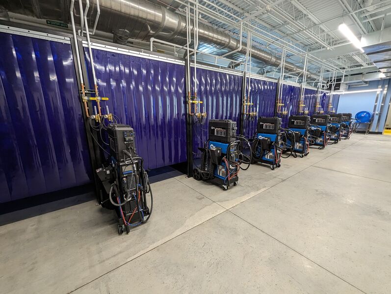 Inside Welding and Training Center, welding booths